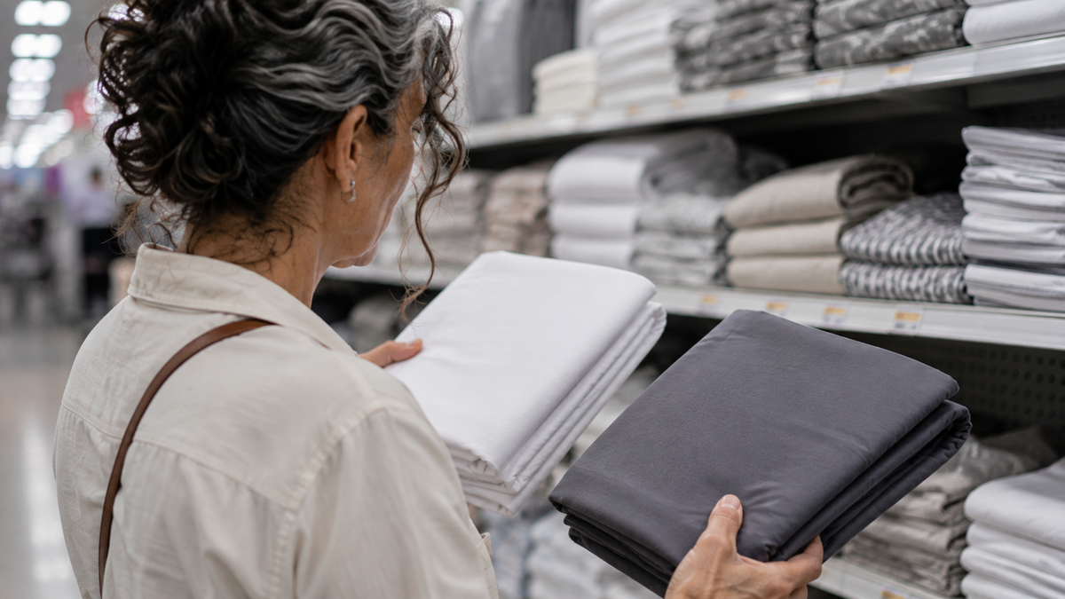 Choosing gray over white bedsheets to hide stains